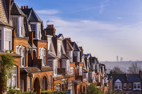 depositphotos_116931276-stock-photo-traditional-british-brick-houses-on